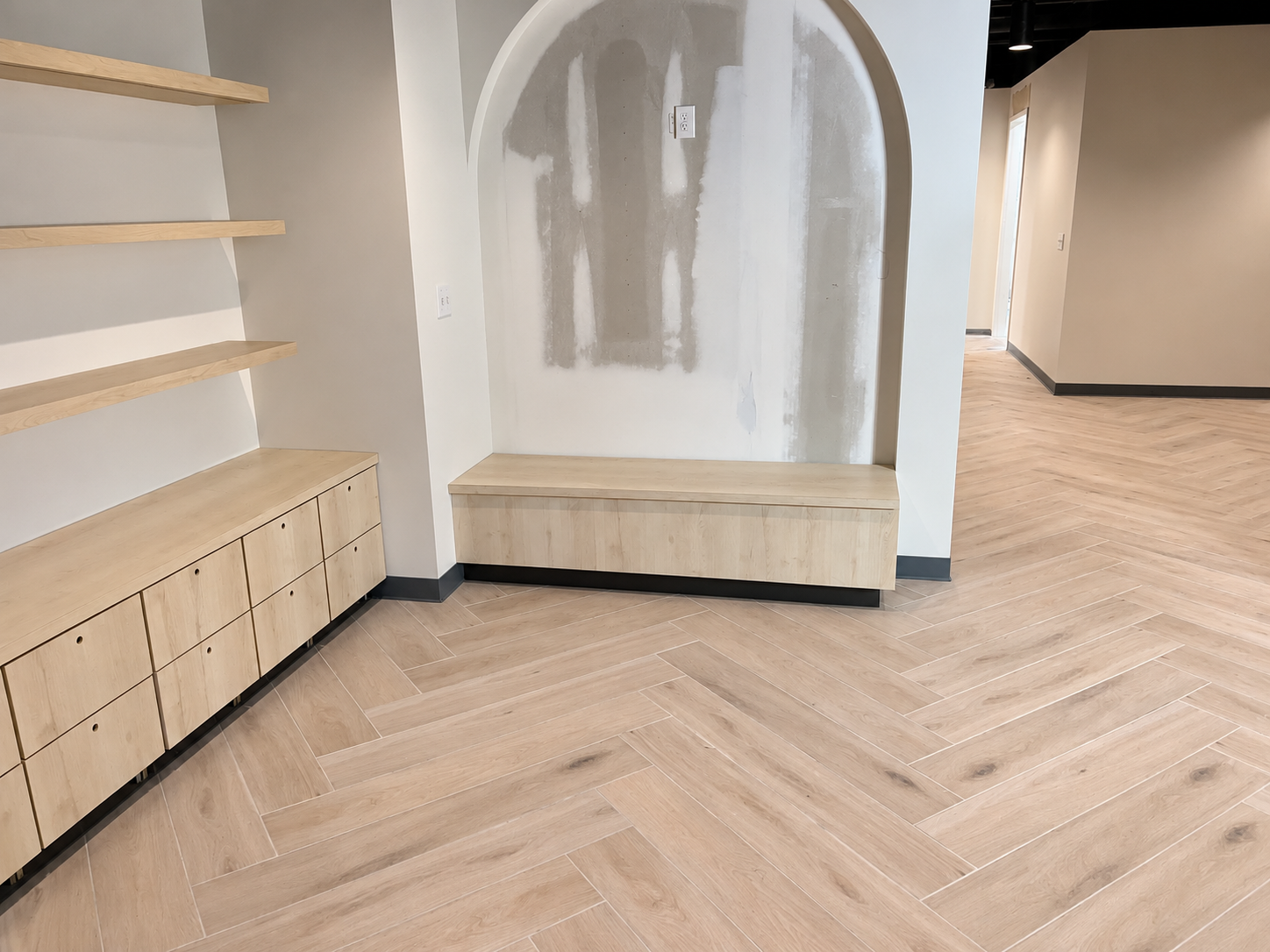 Herringbone floor installation in progress