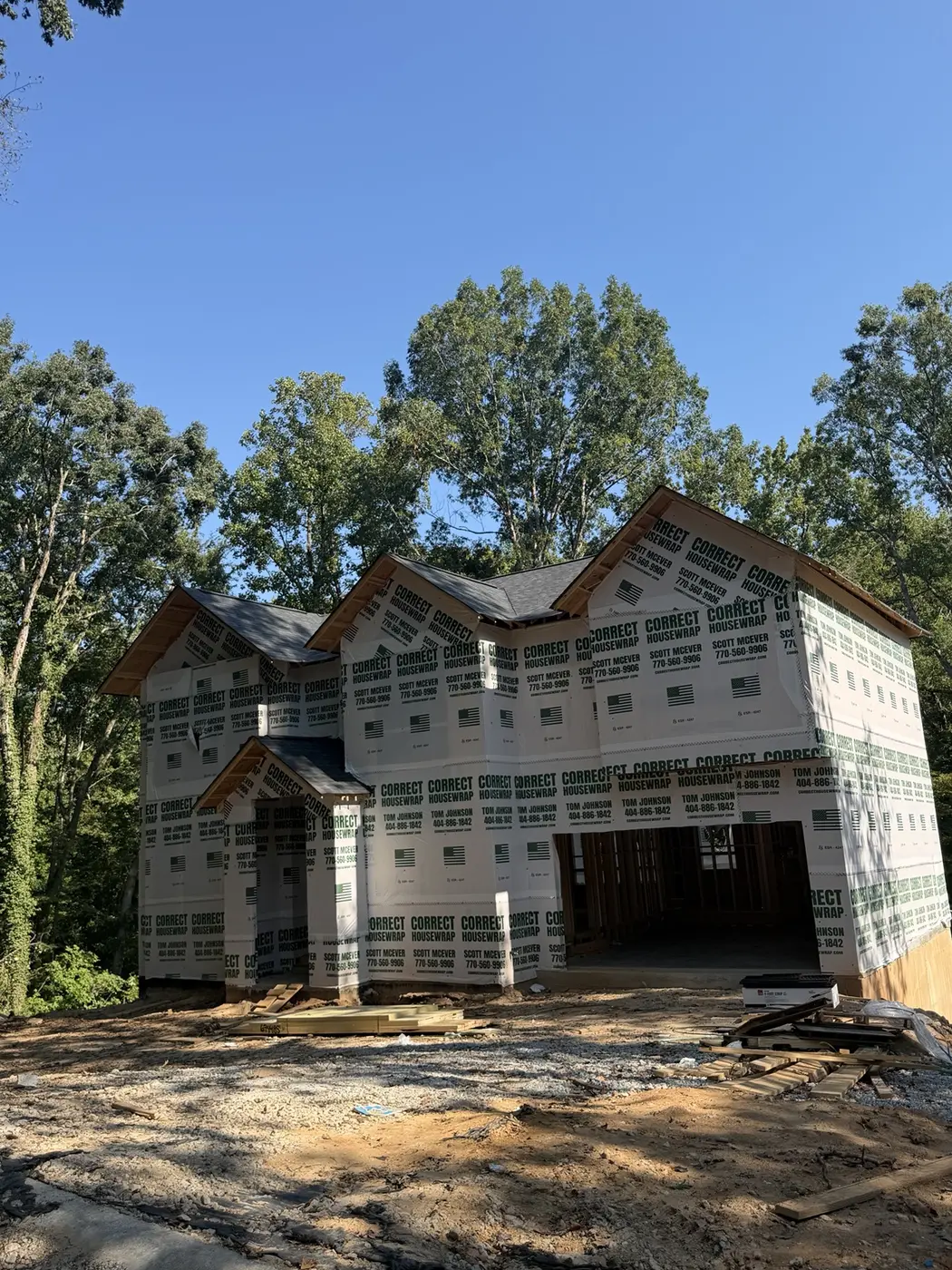 Residential construction exterior at the roof and weather-protection stage