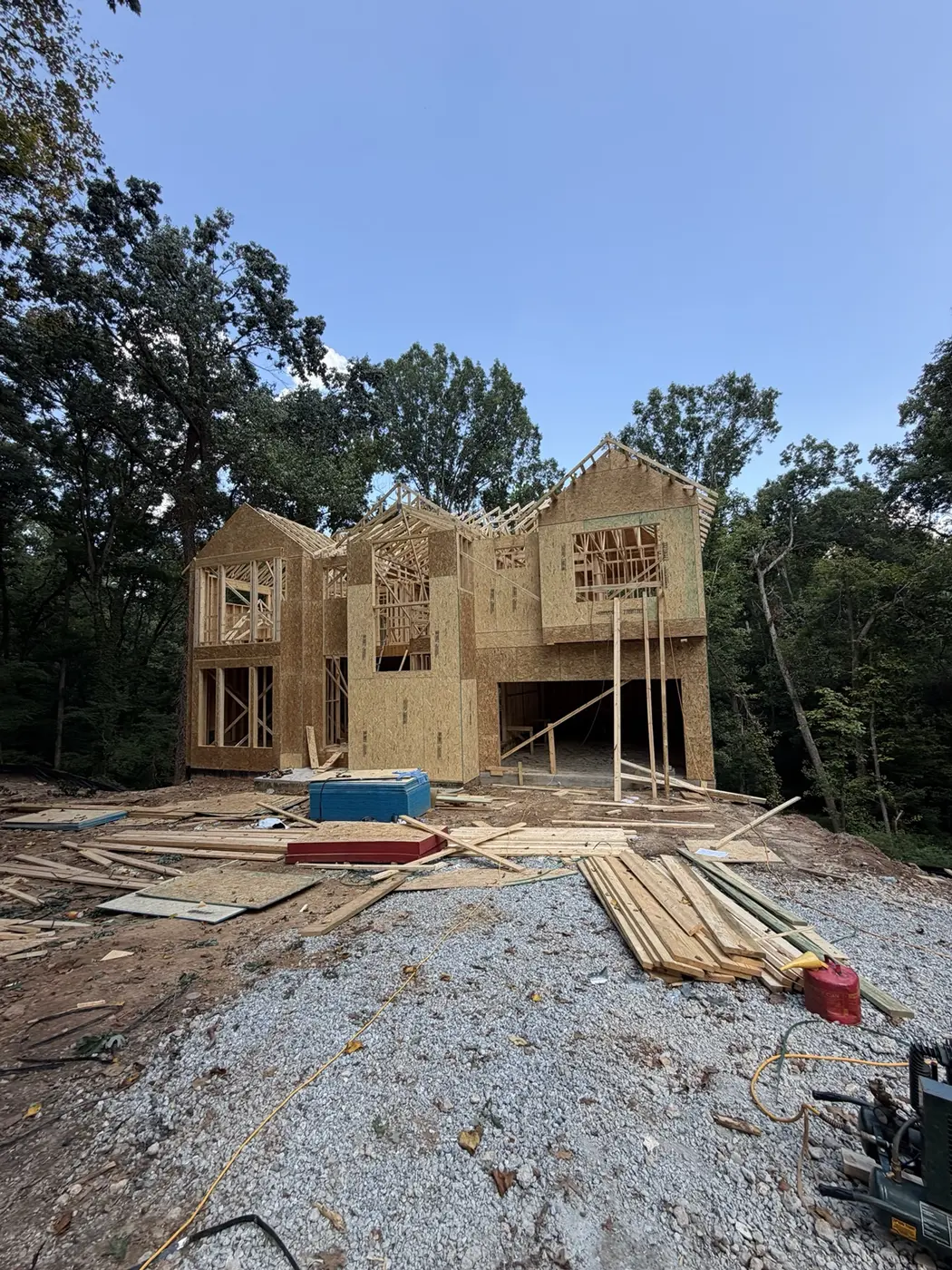 Two-story residential structure in framing, construction in progress